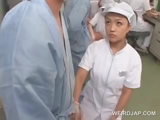 Nasty Asian Nurse Rubbing Her Patients Starved pecker